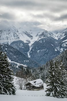 Chalet lost in the mountain with a lot of snow in Switzerland