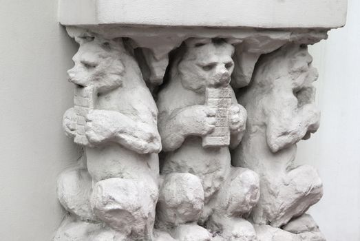 Three plaster bears, detail of a house in Vilnius, Lithuania