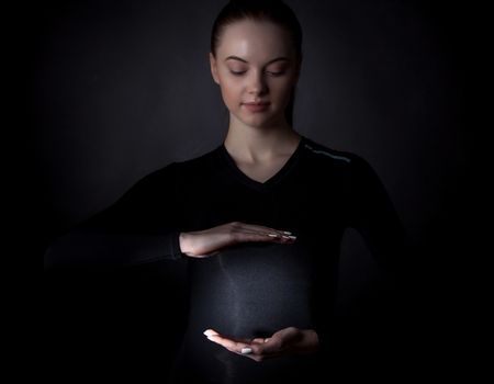 Innovation, future, futuristic object concept, woman holding abstract glowing object, copy space for text design