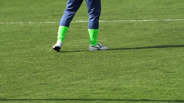 the legs of the goalkeeper during the world Cup of Amateur clubs.