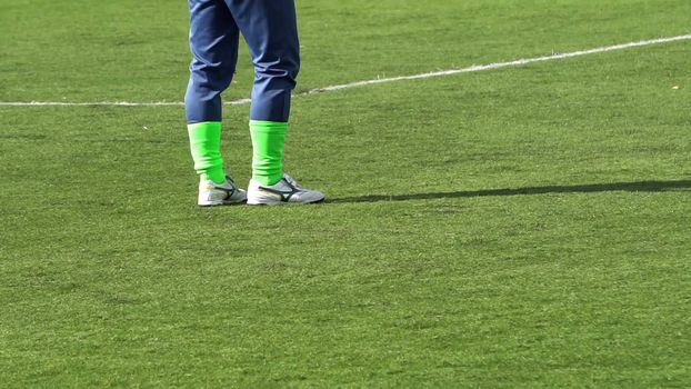 the legs of the goalkeeper during the world Cup of Amateur clubs.