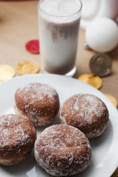 Delicious doughnuts on the white plate. Sweet fresh food concept.