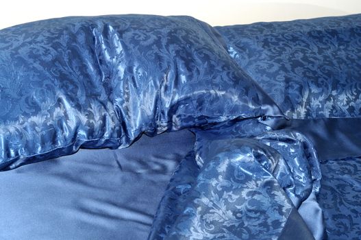 crumpled blue bed, morning sleeper