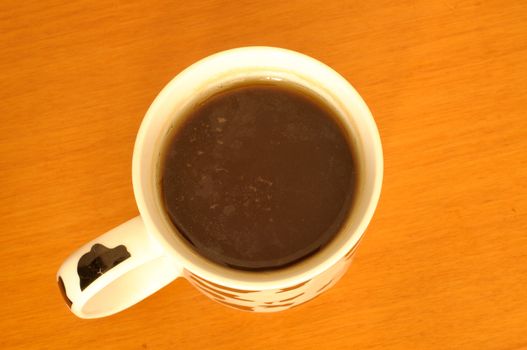 top view of black tea in a mug