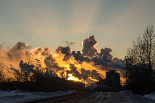 Power plant with smoke and dirty orange air