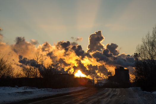 Power plant with smoke and dirty orange air