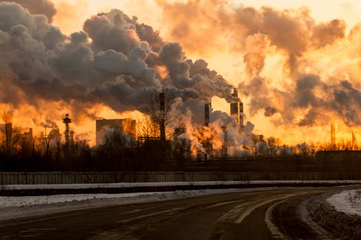 Power plant with smoke and dirty orange air