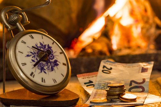 time is money beside the fire