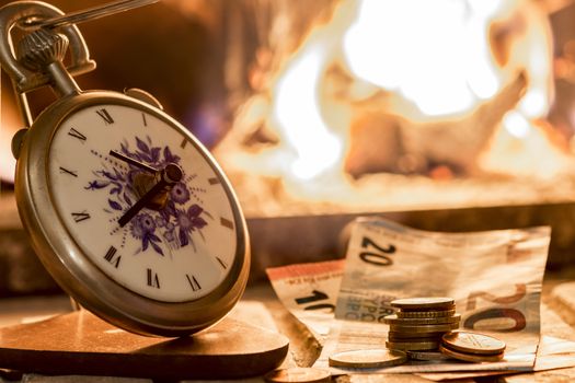 time is money beside the fire