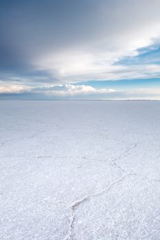 Sunset in Salar de Uyuni salt flats desert, Andes Altiplano, Bolivia