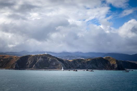 Lighthouse on cliffs near Wellington city, New Zealand