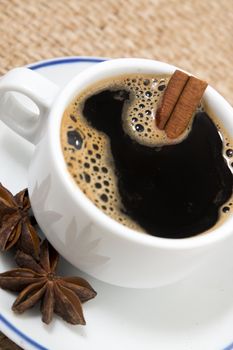View of espresso coffee over a hessian fabric background.