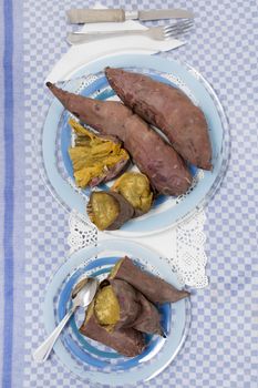 Traditional cooked oven sweet potatoes, from Portuguese cuisine.