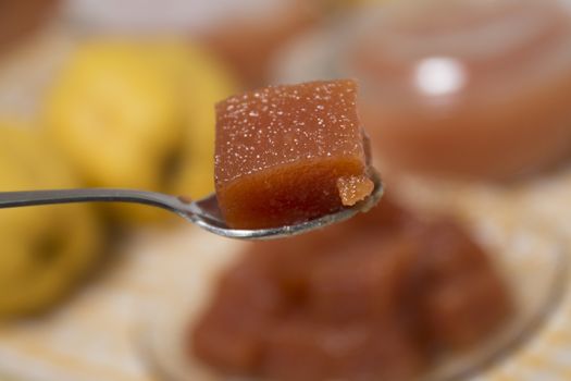 Close up of traditional quince jam homemade with natural ingredients.