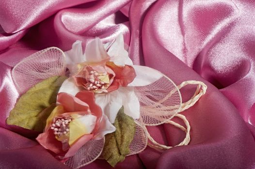 
weddings favors on on the elegant backround fabric