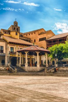 Plaza Mayor, main square in Poble Espanyol, an open-air architectural museum on the Montjuic hill in Barcelona, Catalonia, Spain