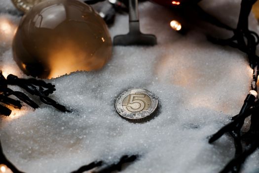 Physical metal polish currency coin. Christmas money concept.