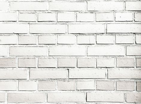 Grungy painted brick wall texture as background. Cracked concrete vintage brick wall background, old painted wall. Background brick painting