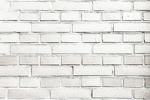 Grungy painted brick wall texture as background. Cracked concrete vintage brick wall background, old painted wall. Background brick painting