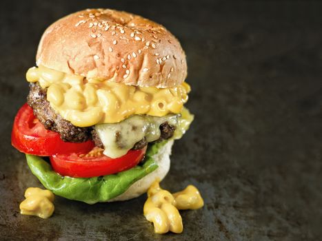 close up of rustic american mac and cheese hamburger