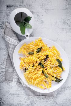 Fusilli pasta with sage and pine nuts. Gluten free. Flour from rice and corn flour