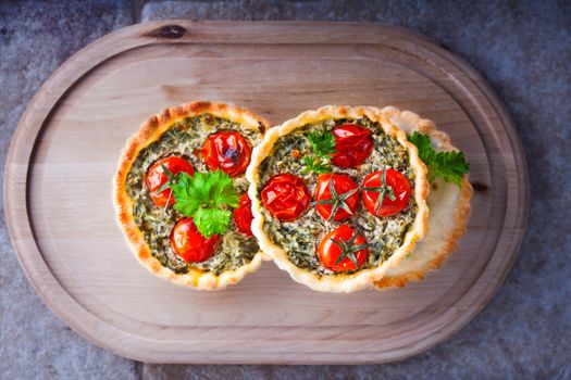 Mini Spinach Quiche served on a white plate