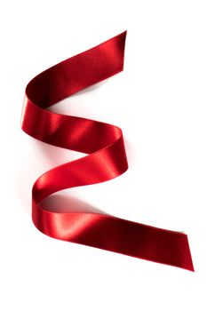 Fabric red ribbon isolated on a white background