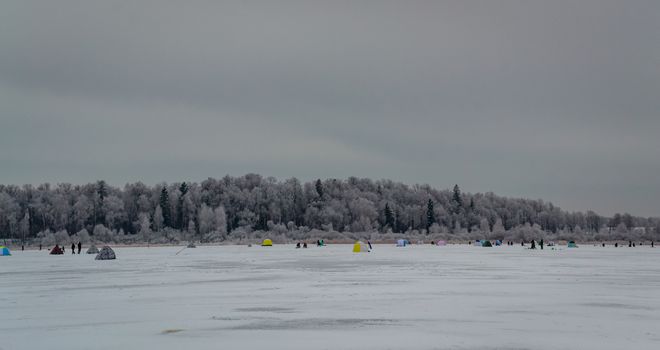 winter sport, winter fishing fishing outside on the ice