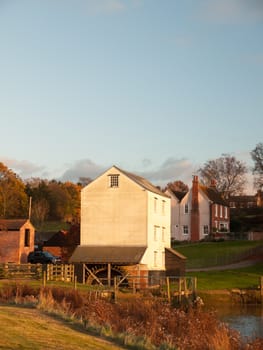 sunny autumn day white old famous mill Alresford countryside scene; essex; england; uk