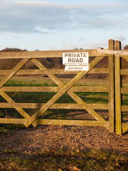 farmland countryside path trail track farm fence sign private road wood; essex; england; uk