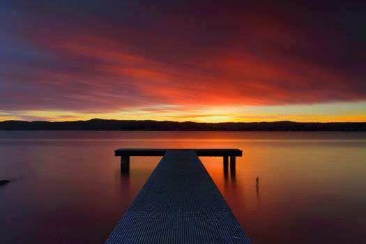 Australian sunsets are unbeatable, the glorious sun sinks just below horizon its last rays emblazing rich colour upon the clouds and painting the waters in similar hues and imprinting upon its onlookers standing in its sunset glow, a quieted soul and an aspirant smile