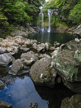 famous cheonjeyeon waterfall in jeju south korea