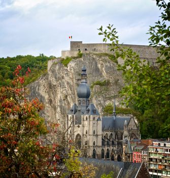 Landscape of Dinant Citadel and Collegiale Notre Dame of Our Lady in Sunny Autumn Day Outdoors. View from Hill Dinant, Belgium