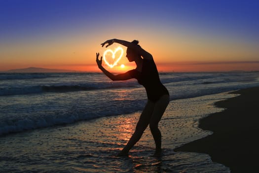 Beautiful Young Dancer at the Beach During Sunset