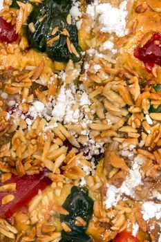 Portuguese King Cake is a famous christmas celebration cake with dry nuts and crystalized fruits.