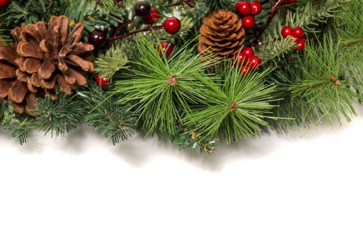 Typical Christmas decorative garland isolated on a white background.
