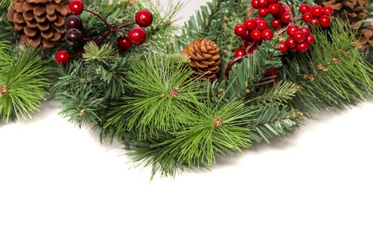 Typical Christmas decorative garland isolated on a white background.