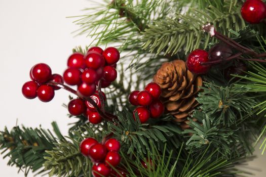 Typical Christmas decorative garland isolated on a white background.