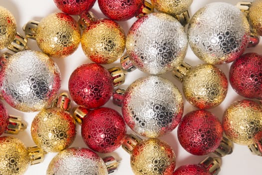Group of colorful christmas balls on a white background.