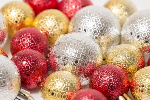 Group of colorful christmas balls on a white background.
