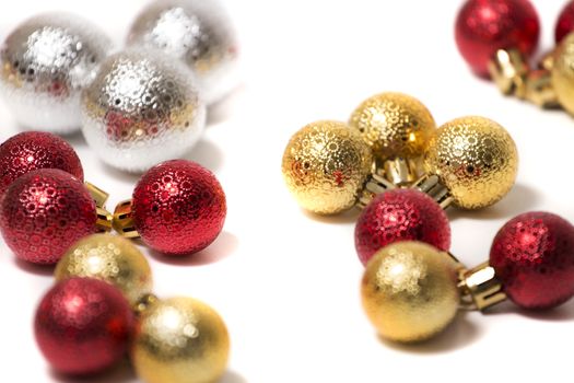 Group of colorful christmas balls on a white background.
