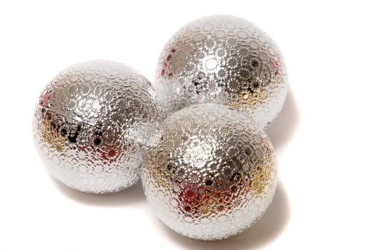 Group of colorful christmas balls on a white background.