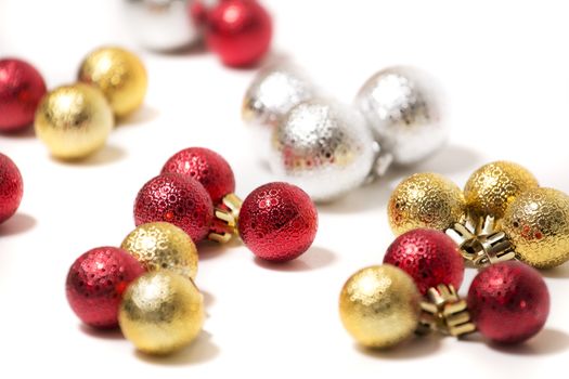 Group of colorful christmas balls on a white background.