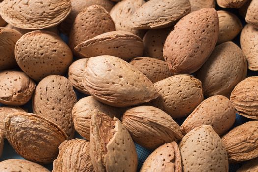 Group of sweet almonds all together on a pile.