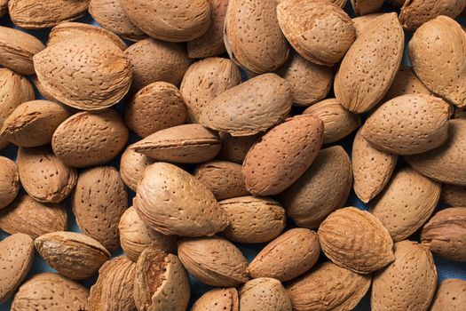 Group of sweet almonds all together on a pile.