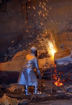 welder cut metal  in steel plant