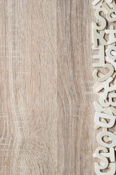 Top view wooden alphabet study english letters,ABC alphabet on wood as a background composition with copy space