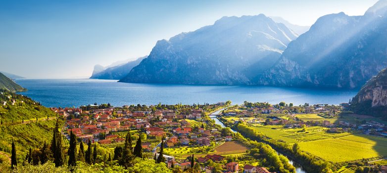 Town of Torbole and Lago di Garda sunset view, Trentino Alto Adige region of Italy