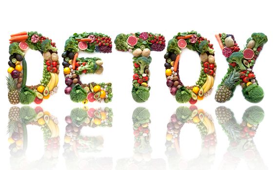 Detox spelt using large letters made of fruits and vegetables 