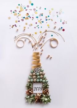 Champagne bottle made from decorations explosion